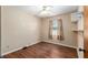 Bedroom with ceiling fan, hard surface floors, natural light from a window, and built-in shelving at 3200 Se 34Th St, Ocala, FL 34471