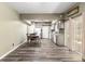 Combined dining area and kitchen with neutral paint and wood flooring at 3200 Se 34Th St, Ocala, FL 34471