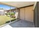 Covered screened patio providing an outdoor space with a view of a landscaped backyard and a partial privacy fence at 3200 Se 34Th St, Ocala, FL 34471