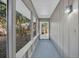 Relaxing screened-in porch surrounded by lush foliage and tranquil views at 700 Crestwood Way, Winter Springs, FL 32708