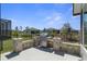 Spacious backyard with outdoor grill area, perfect for entertaining, surrounded by lush landscaping at 8534 Sw 59Th Lane Rd, Ocala, FL 34481