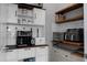 Convenient butler's pantry with custom shelving and cabinet storage for kitchen appliances at 8534 Sw 59Th Lane Rd, Ocala, FL 34481