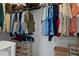 Well-organized closet featuring shelving for clothing and storage containers at 8534 Sw 59Th Lane Rd, Ocala, FL 34481