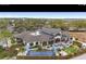 New community clubhouse with outdoor seating, shuffleboard, and beautifully landscaped grounds at 8534 Sw 59Th Lane Rd, Ocala, FL 34481