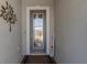 Close-up of the front entry with a decorative glass door, stone accents, and a 'Welcome' sign at 8534 Sw 59Th Lane Rd, Ocala, FL 34481