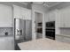 Contemporary kitchen with stainless steel fridge, built-in microwave, and stylish backsplash at 8534 Sw 59Th Lane Rd, Ocala, FL 34481