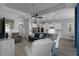 Spacious open-concept with living room, kitchen, and dining area for seamless entertaining at 8534 Sw 59Th Lane Rd, Ocala, FL 34481