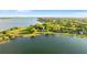 Overhead shot of waterfront houses with private docks, highlighting a serene and exclusive neighborhood on the lake at 248 Lake Tennessee Dr, Auburndale, FL 33823