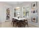 Bright dining area with plantation shutters and access to the outdoor living spaces at 248 Lake Tennessee Dr, Auburndale, FL 33823