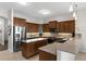Well-equipped kitchen featuring stainless steel appliances, an island, and plenty of cabinet space at 248 Lake Tennessee Dr, Auburndale, FL 33823