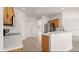 Bright kitchen featuring white countertops, stainless steel appliances, and wood cabinets at 3601 Weatherfield Dr, Kissimmee, FL 34746