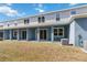 Backyard view with a patio and ample space for outdoor entertaining and recreation at 5244 Luisa Ct, St Cloud, FL 34771