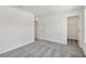 Spacious bedroom with soft carpet, neutral paint, and entry to closet and other rooms at 5244 Luisa Ct, St Cloud, FL 34771