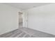 Clean bedroom features neutral paint, soft carpet, and white trim at 5244 Luisa Ct, St Cloud, FL 34771