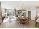 Sunlit open floor plan with combined living, dining, and kitchen areas, great for Gathering living at 1104 Desert Candle Dr, Ocoee, FL 34761