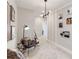 Hallway with vinyl records decor and contemporary lighting at 2473 Magnolia Reserve Rd, Ocoee, FL 34761