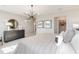 Bright bedroom featuring an open closet and modern decor at 2473 Magnolia Reserve Rd, Ocoee, FL 34761