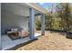 Covered outdoor patio featuring stylish seating, perfect for relaxing and entertaining at 5228 Luisa Ct, St Cloud, FL 34771
