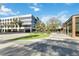 Bustling town center plaza with lush green spaces, dining, and contemporary architecture at 5228 Luisa Ct, St Cloud, FL 34771
