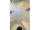 Shower with tiled walls and seating at 10867 Sw 83Rd Ct, Ocala, FL 34481