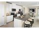Modern kitchen with granite countertops, stainless steel appliances, and a large island at 5000 Balsam Falls Rd, Deland, FL 32724