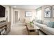 Inviting living room with comfortable seating, natural light, and stylish decor at 5012 Bear Lake Loop, Deland, FL 32724