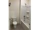 Bathroom featuring a shower/tub combo and toilet, maximizing space and functionality at 1707 Jindo Dr, Lake Alfred, FL 33850