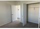 Bright bedroom with closet and carpet floors at 1707 Jindo Dr, Lake Alfred, FL 33850