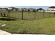 Outdoor community dog park with secure fencing and seating for pet owners at 1707 Jindo Dr, Lake Alfred, FL 33850