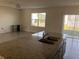 Bright, open kitchen with granite countertops and stainless steel sink at 1707 Jindo Dr, Lake Alfred, FL 33850
