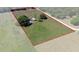 An aerial view of the property showing its size and landscape with pool and barn at 3815 Se 25Th St, Bushnell, FL 33513