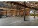 Spacious barn interior with open layout, wooden beams, and concrete floor provides versatile space at 3815 Se 25Th St, Bushnell, FL 33513