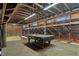 Barn upper level features exposed beams and a pool table at 3815 Se 25Th St, Bushnell, FL 33513