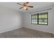 Bedroom featuring a large window offering lots of natural light and neutral paint at 3815 Se 25Th St, Bushnell, FL 33513