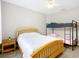 Cozy bedroom with a twin over full bunk bed and a full-size bed, carpet flooring, and ceiling fan at 4649 Sw 103Rd Street Rd, Ocala, FL 34476