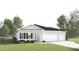 Charming single-Gathering home featuring a well-manicured lawn, attached two-car garage, and stylish white stucco exterior at 11030 Nellie Crossing Cir, Clermont, FL 34711
