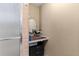 Bathroom featuring a vanity area, a glass-enclosed shower, and neutral finishes at 1711 Tierra Alta Dr, Lakeland, FL 33813