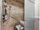 Bathroom with tiled shower and grab bar for accessibility at 1711 Tierra Alta Dr, Lakeland, FL 33813