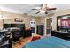 Spacious bedroom featuring a functional workspace, natural light, and seamless flow to the ensuite bathroom at 1711 Tierra Alta Dr, Lakeland, FL 33813