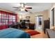 Bright bedroom with ample workspace, natural light, and easy access to a spacious walk-in closet at 1711 Tierra Alta Dr, Lakeland, FL 33813