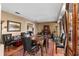 Bright dining room with a large wooden table, seating for eight and a view into other living spaces at 1711 Tierra Alta Dr, Lakeland, FL 33813