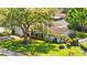 Well-maintained home with manicured lawn and mature trees at 1711 Tierra Alta Dr, Lakeland, FL 33813