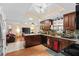 Open-concept kitchen offering ample counter space, modern appliances, and seamless connection to the living area at 1711 Tierra Alta Dr, Lakeland, FL 33813