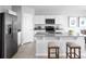 Bright, modern kitchen with granite countertops, stainless steel appliances, and a convenient island at 744 Cantaberry Dr, Dundee, FL 33838