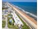 Aerial view of condo buildings along the beach with stunning ocean views from the beach at 2600 Ocean Shore Blvd # 111, Ormond Beach, FL 32176