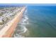 Gorgeous aerial view of the beach and shoreline from a coastal condo community at 2600 Ocean Shore Blvd # 111, Ormond Beach, FL 32176