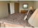 Spacious bedroom with large bed and a view to the beach at 2600 Ocean Shore Blvd # 111, Ormond Beach, FL 32176