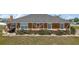 Charming single-story home with decorative touches and well-maintained landscaping at 7355 Se 106Th Pl, Belleview, FL 34420