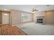A spacious living room with fireplace, neutral color palette and great natural light at 7355 Se 106Th Pl, Belleview, FL 34420