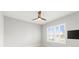 Bedroom features modern ceiling fan, neutral walls, and plantation shutters offering natural light at 9262 Sw 102Nd Avenue Rd, Ocala, FL 34481